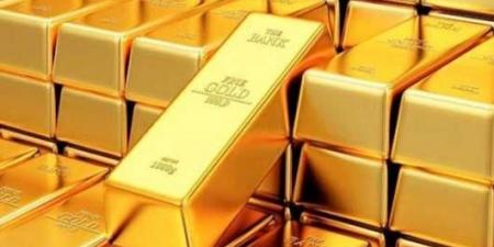 الذهب يتراجع عن أعلى مستوى في أسبوعين مع ارتفاع الدولار